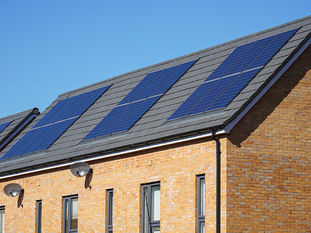 Modern new build social housing developments fitted with roof solar panels