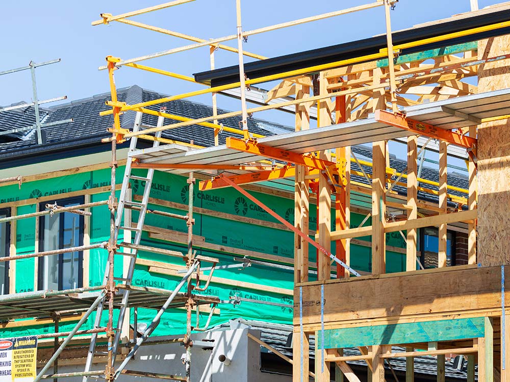 External insulation and scaffolding installed on a property during a retrofit consultancy project